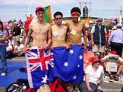 Young men covering themselves with a flag